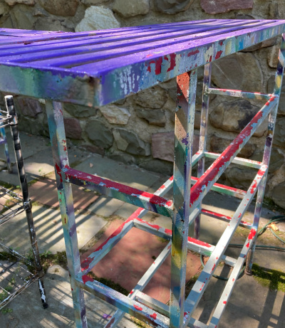 Graffiti metal outdoor bar detail