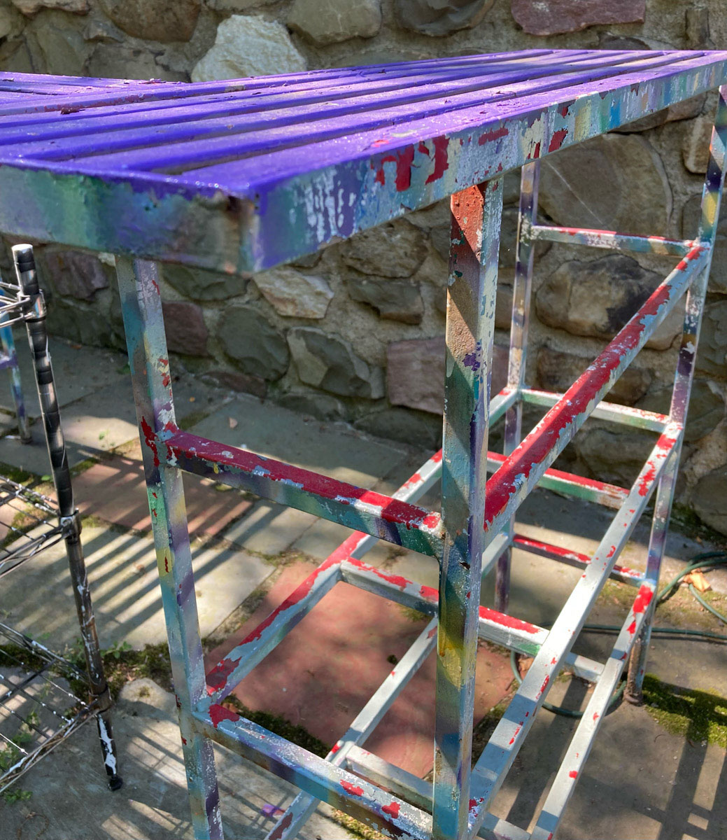 Graffiti metal outdoor bar detail
